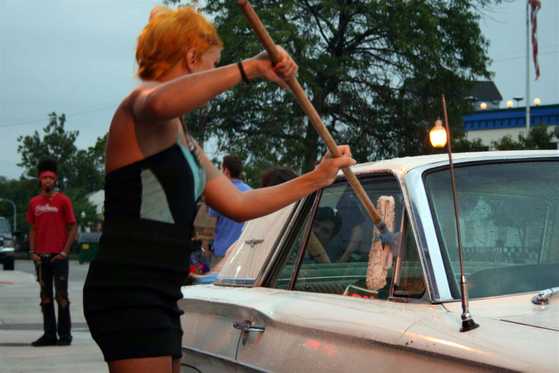 Illustration for article titled Noir Leather Bikini Car Wash Meetup Pictures